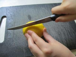 Cut a lemon into halves